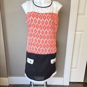 Coco & Tashi Dress with Orange Pattern and Black Accents